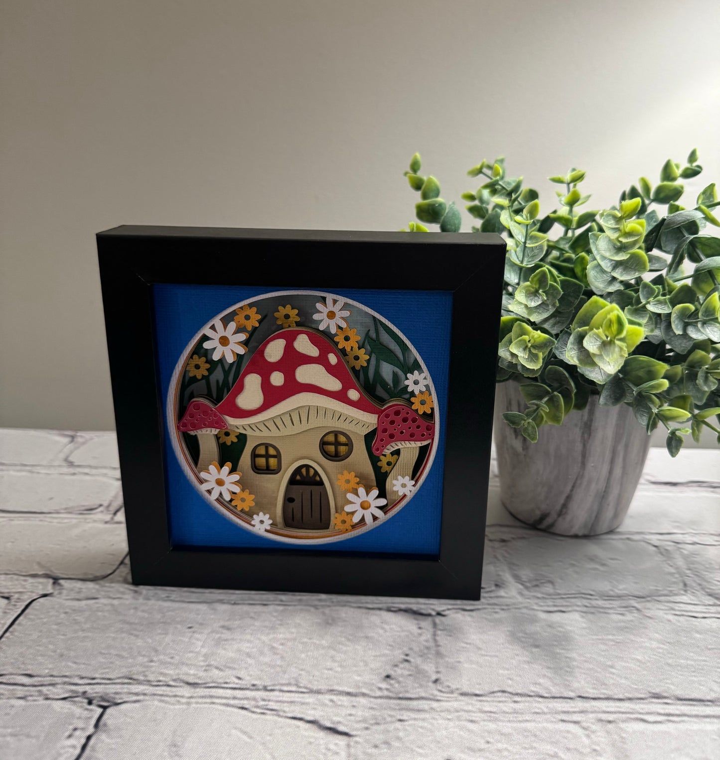 Mushroom house mini 3D paper art in a shadowbox