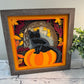 Black cat on a pumpkin 3D paper art in a shadowbox