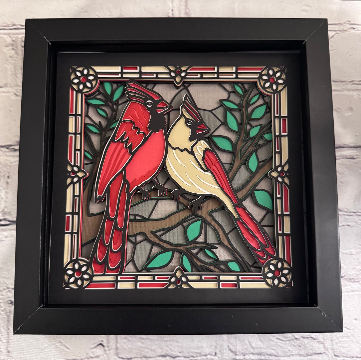 Stained glass cardinals 3D paper art in a shadowbox