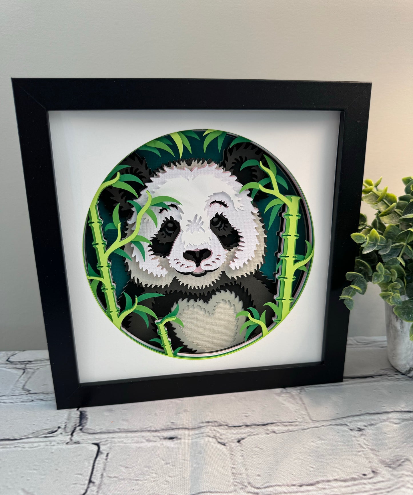 Panda with bamboo 3D paper art in a shadowbox