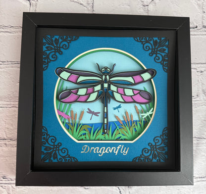 Intricate frame dragonfly 3D paper art in a shadowbox