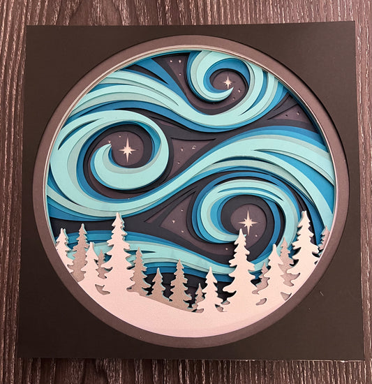 Swirling winter skies with white trees 3D paper art on a shadowbox