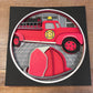 Fire station with truck and helmet 3D paper art in a shadowbox