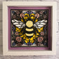Colorful bee stained glass look 3D paper art in a shadowbox