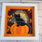 Black cat on a pumpkin 3D paper art in a shadowbox