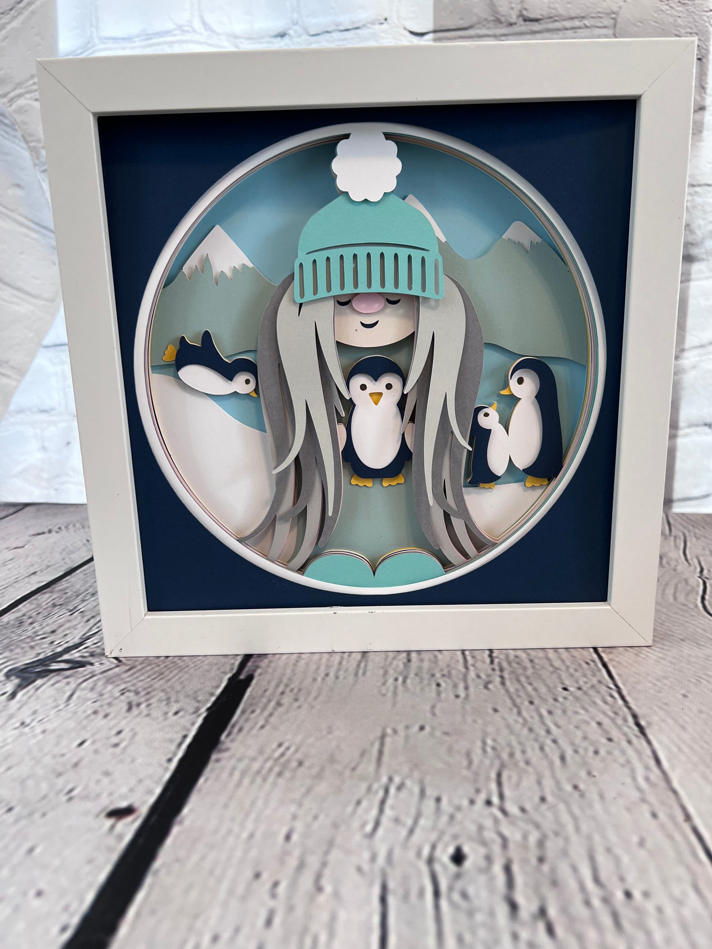 Winter gnome-penguin 3D paper art in a shadowbox