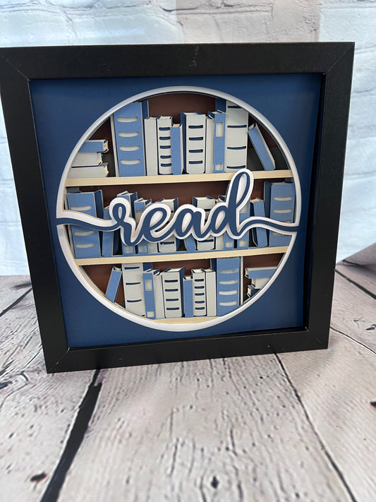 Read 3D paper art in a shadowbox